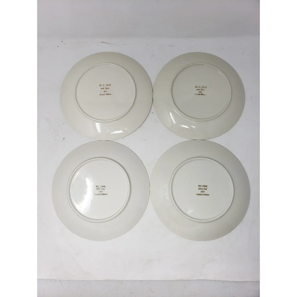 B. C. CLARKS Set of 7, 77th 80th 90th 91st 92nd 97th & 101st Christmas Plates